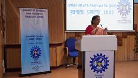 A person speaking at a podiumAI-generated content may be incorrect.